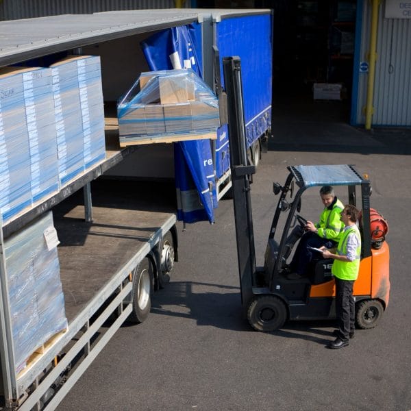 Unloading a double decker trailer of palletised stock